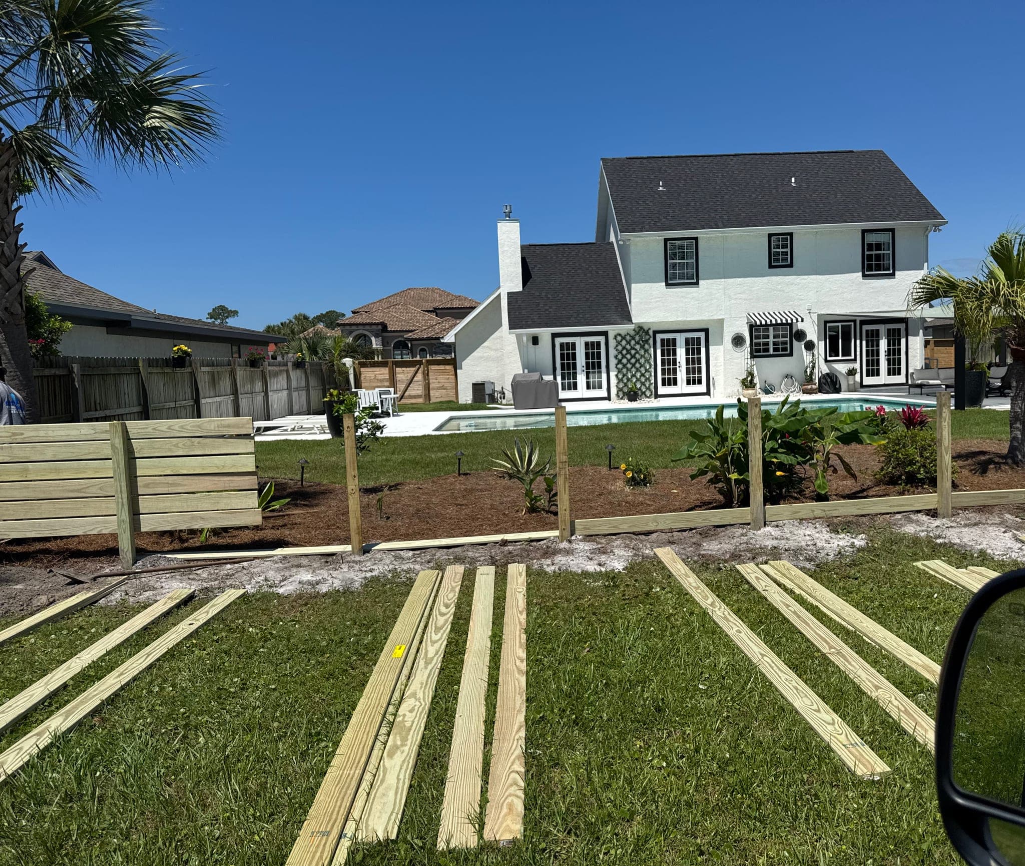 Backyard Landscape & Fence Installation — Photo 2
