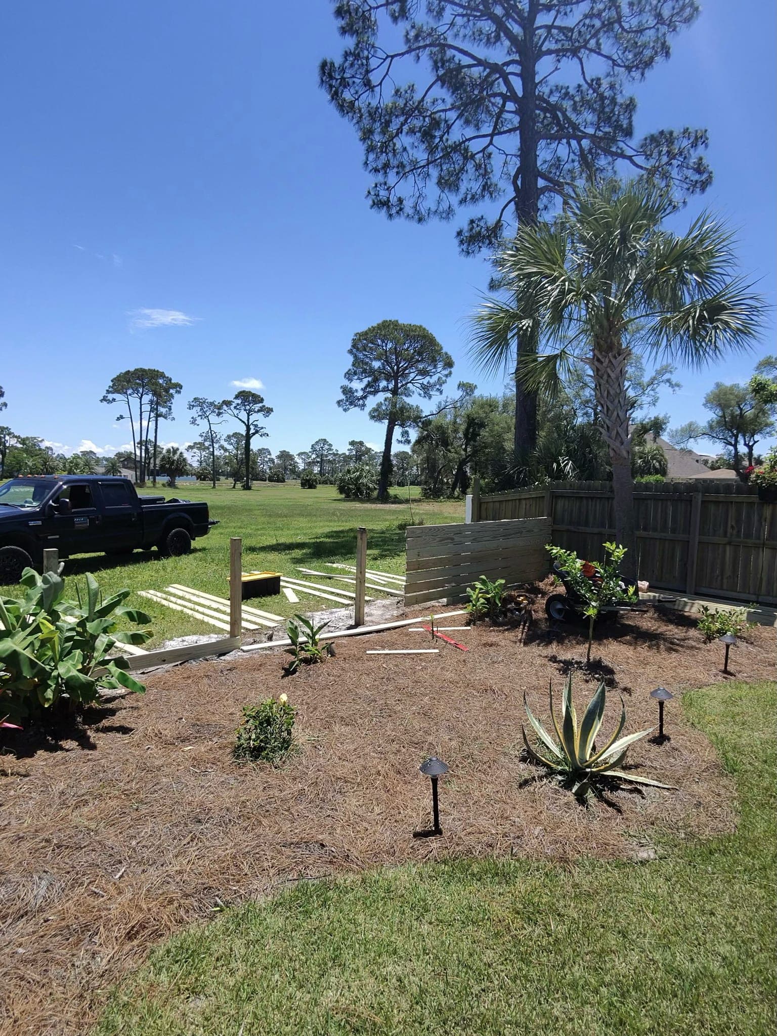 Backyard Landscape & Fence Installation — Photo 4