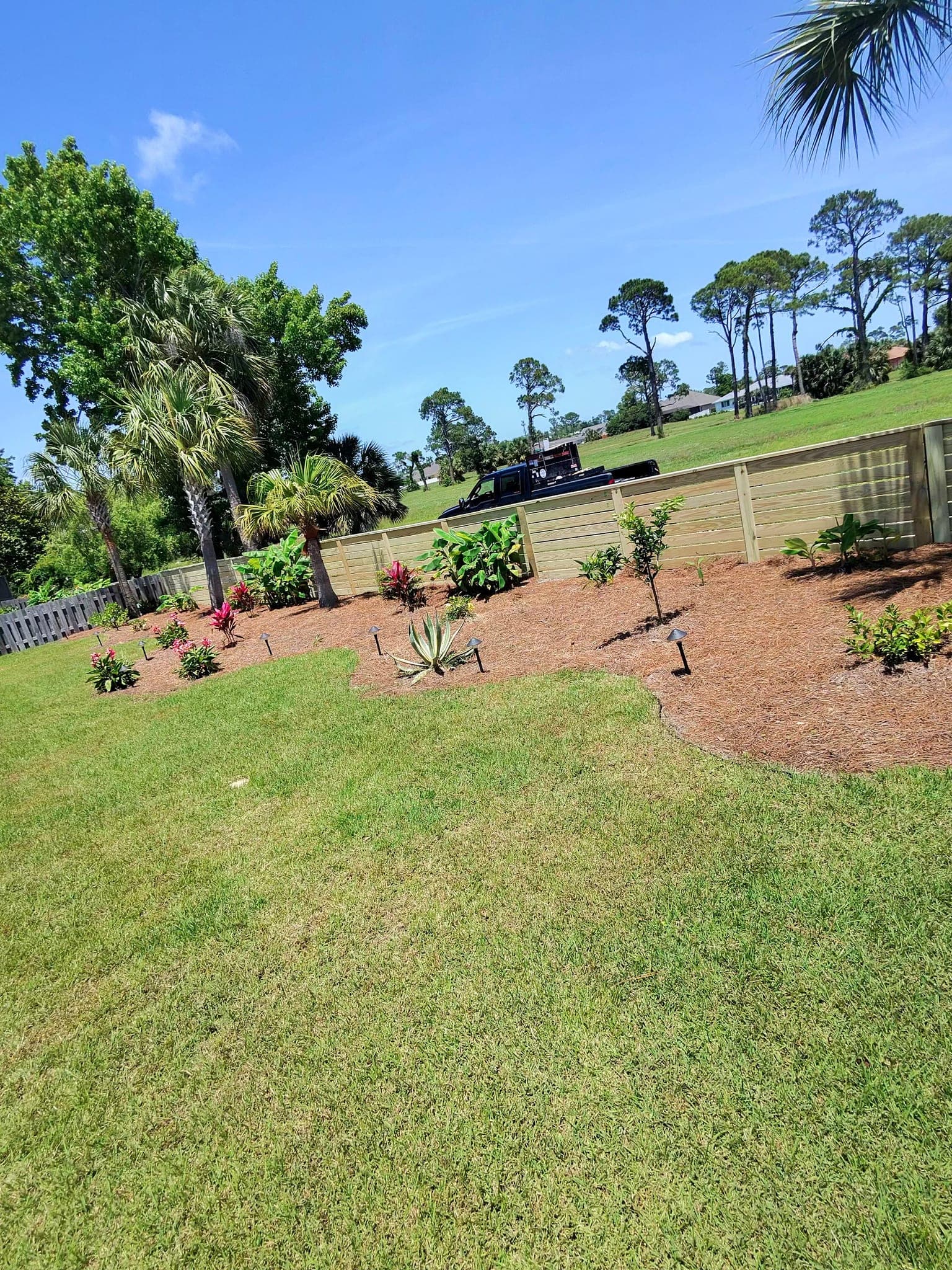 Backyard Landscape & Fence Installation — Photo 6